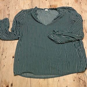 Green and white long sleeved v neck blouse